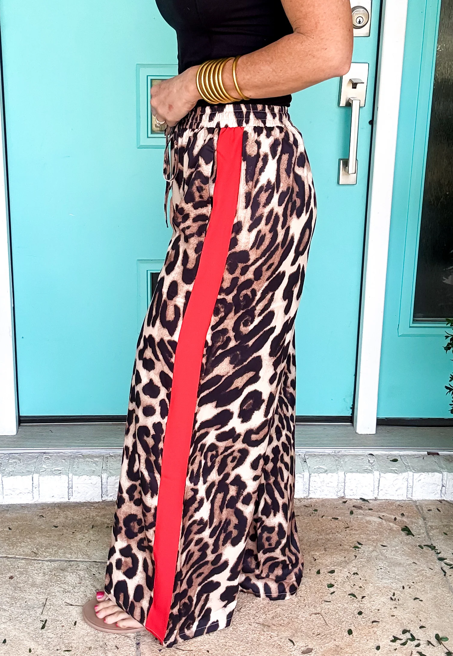 Roaring in Red Leopard Pants - Image 2